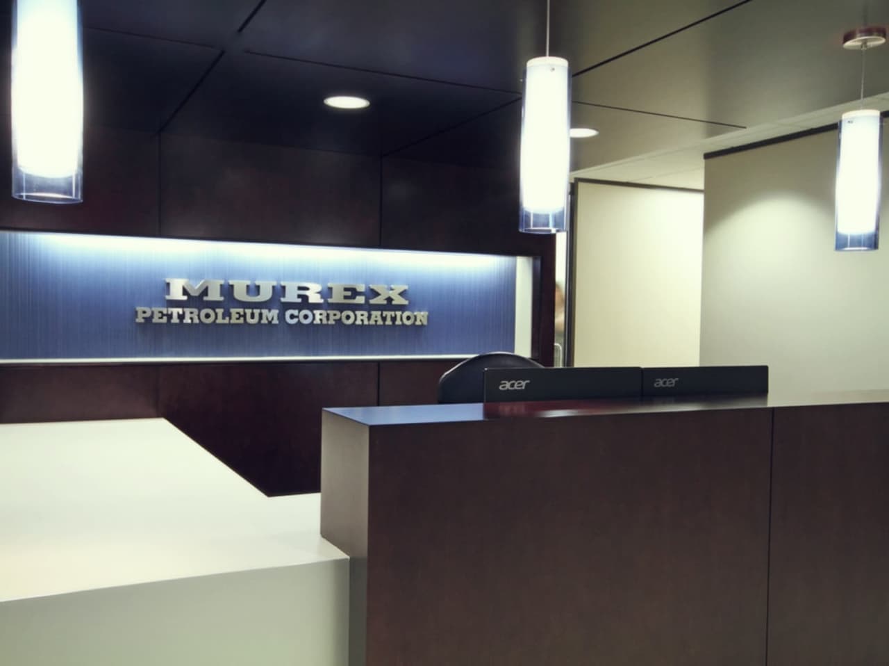 Murex Petroleum staff kitchen with island and pendant lighting